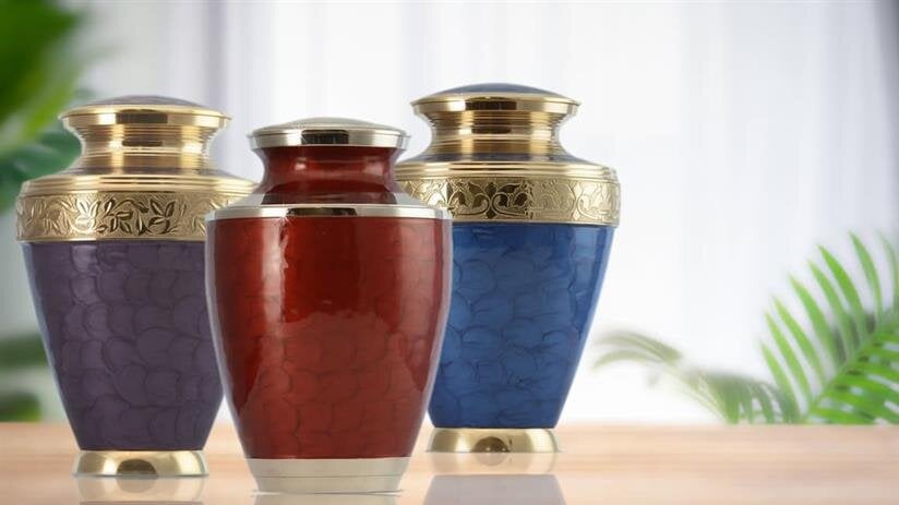 A group of urns on a table
