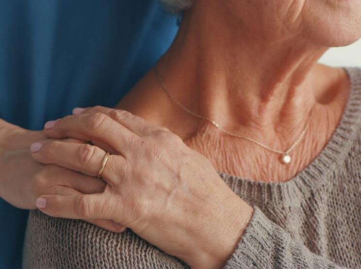 A close-up of a woman's neck
