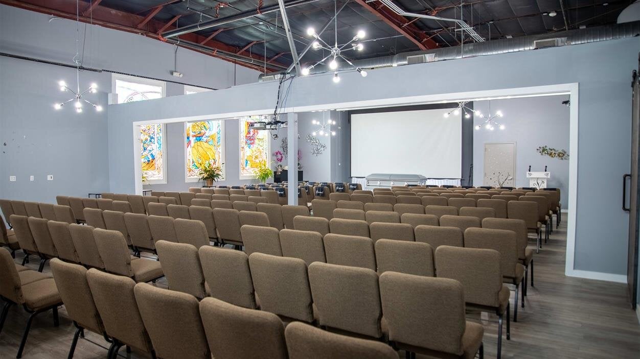 A room with rows of chairs