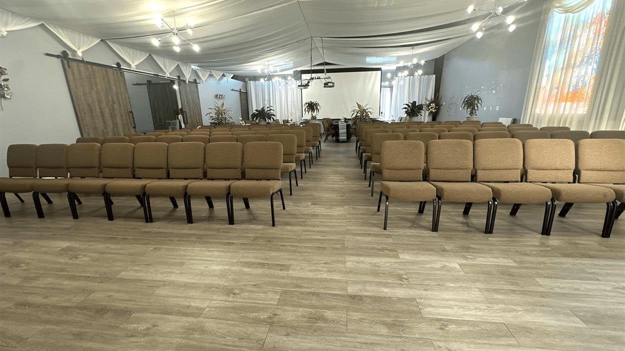A room with many chairs