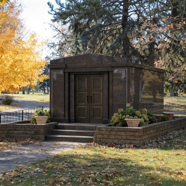 A small stone structure with a door and steps
