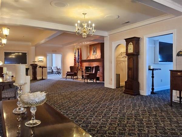 Renovated interior gathering space at <span data-replace-var='Website.BusinessName' class='we-content-readonly' data-default-value='Methuen+Family+Funeral+Home' data-allow-empty>Methuen Family Funeral Home</span>