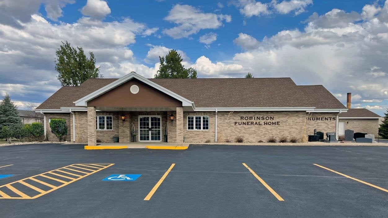 A building with a parking lot