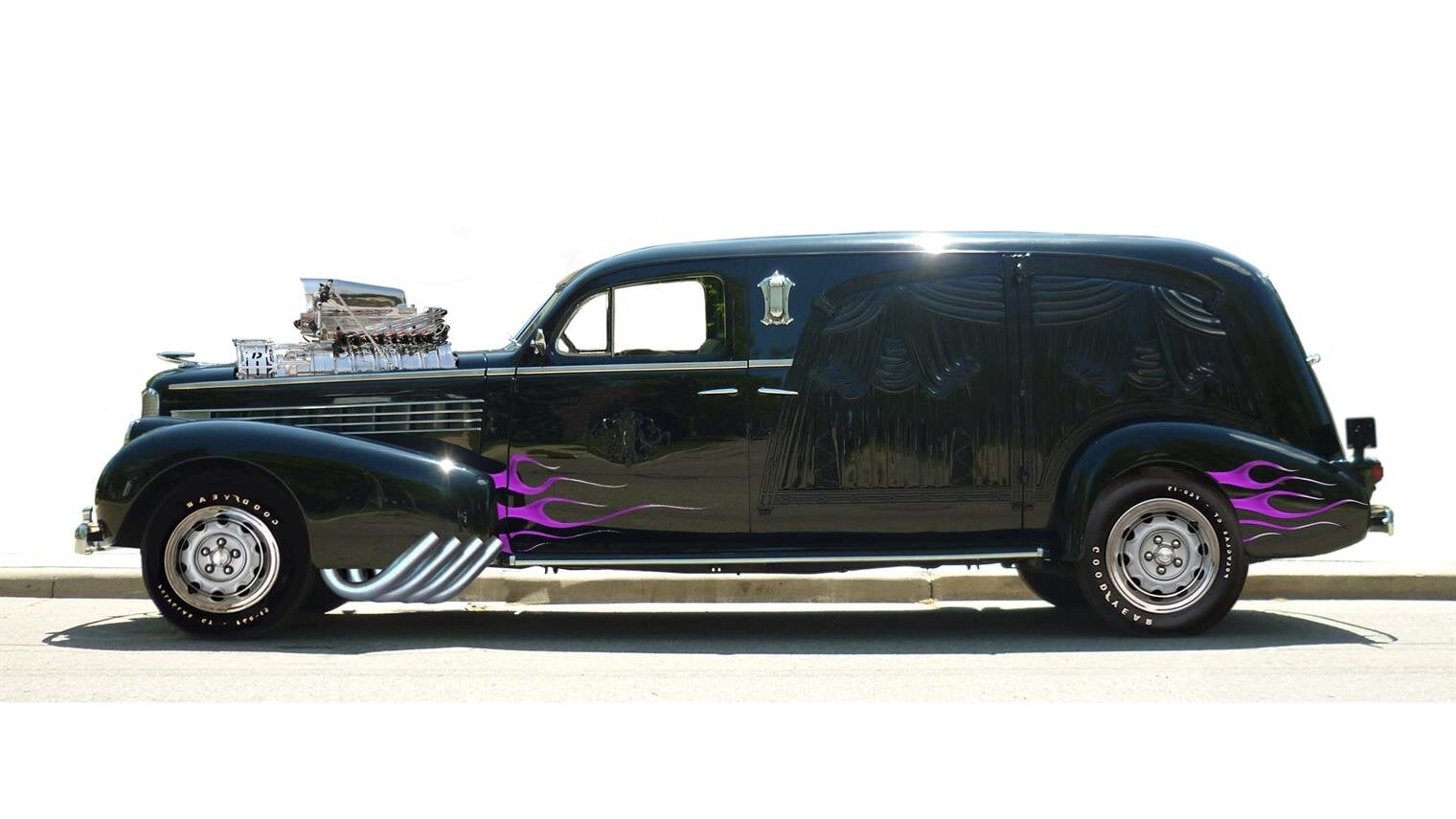 A black car with purple flames