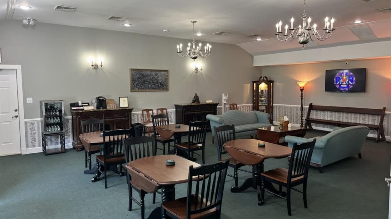 A room with tables and chairs