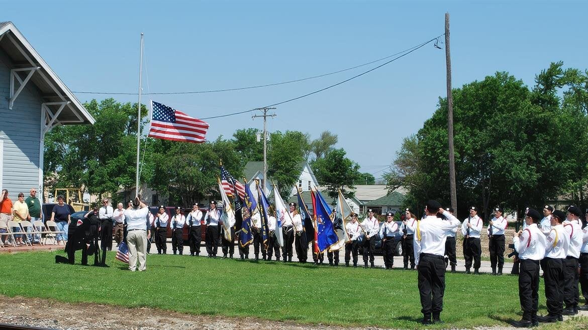 A group of people holding flags