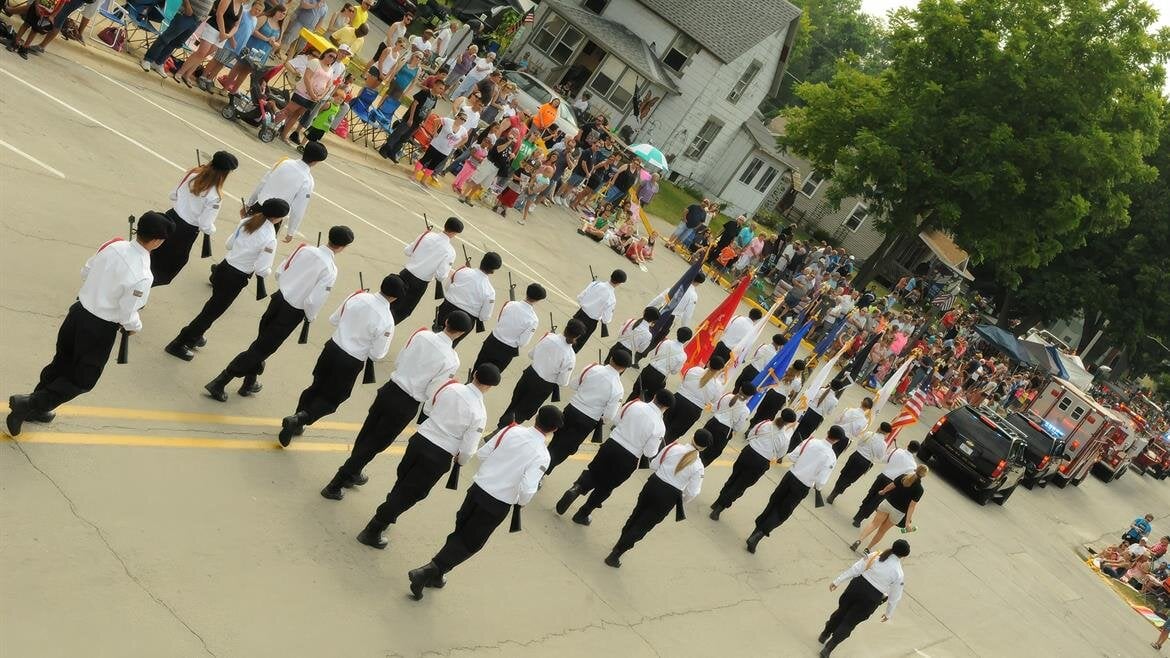 A group of people marching in a parade