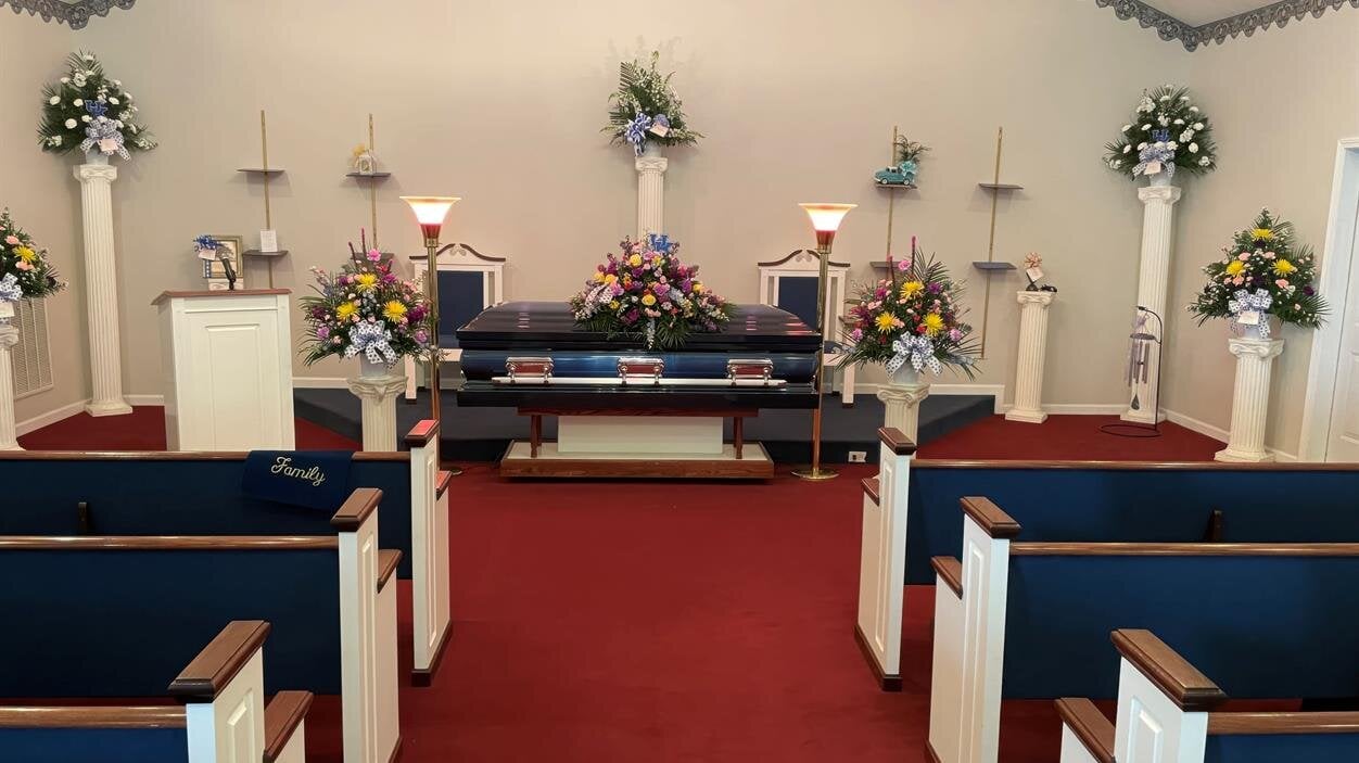 A funeral casket in a church