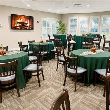 A room with tables and chairs