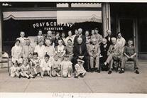 The Pray family and relatives at a family reunion at the Pray Furniture and Undertaking establishment in 1936.