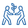 Two individuals working together to plant a small tree in a garden, promoting teamwork and nature.