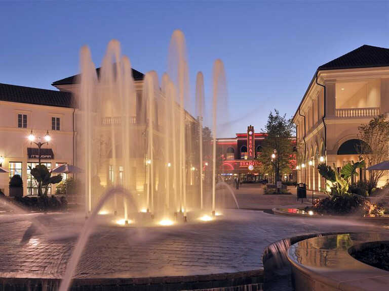 Deer Park Arches Tangier fountains lit up with white lights in deer park