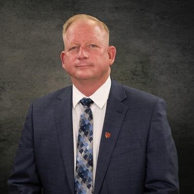Mr. Mark B. McCaleb