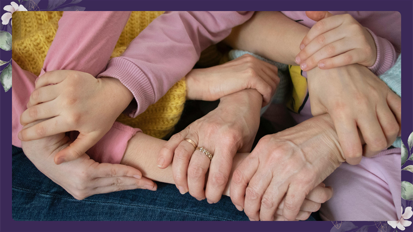 Close-up of hands holding each other