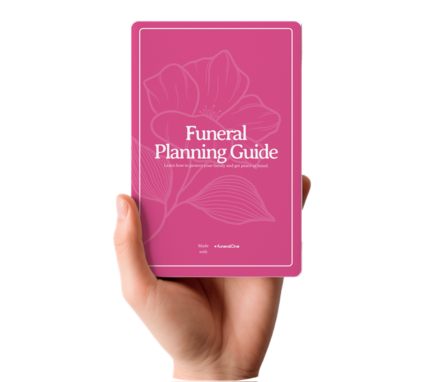 A hand holding a pink card