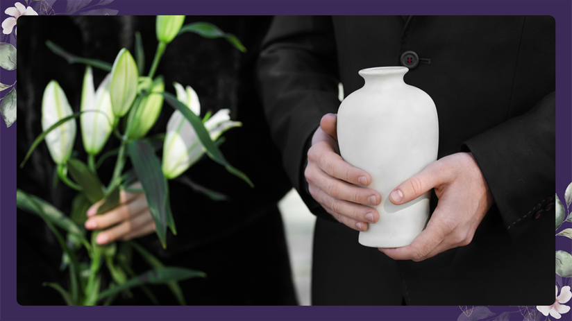 A person holding a vase