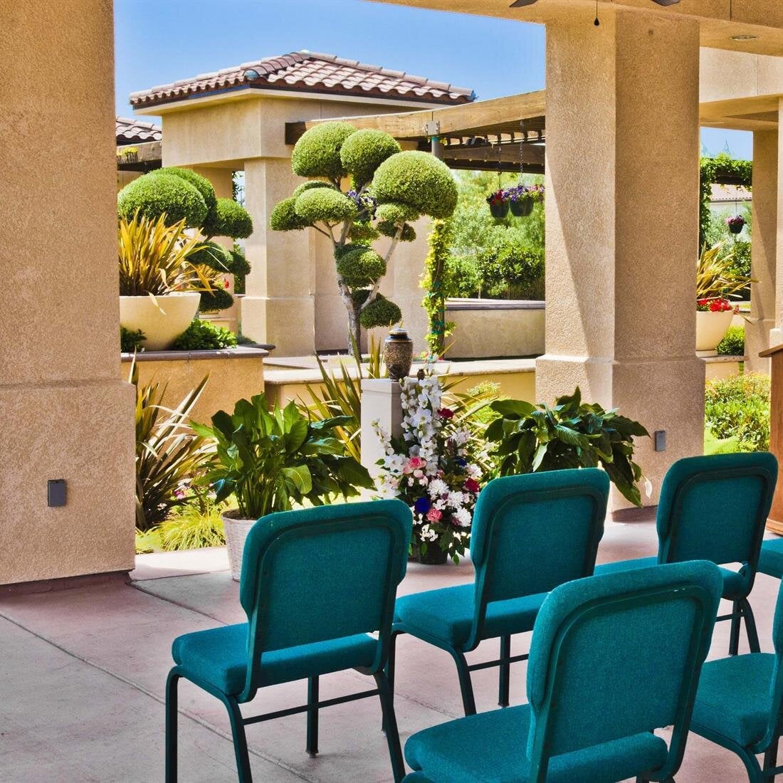 A group of chairs in a courtyard