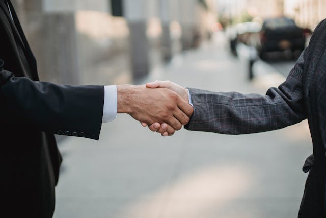 Compassionate planning handshake for Albany, NY cremation services and preplanning