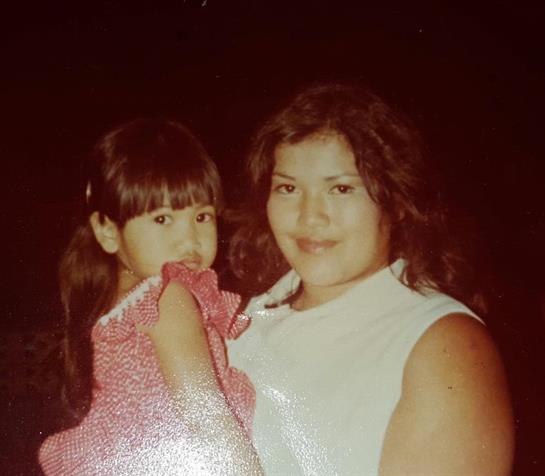 A woman holding a child