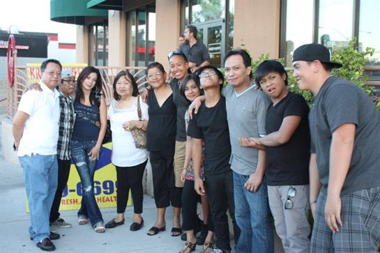 A group of people standing outside a building