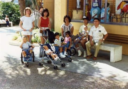 A group of people with strollers