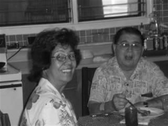 A couple of people sitting at a table