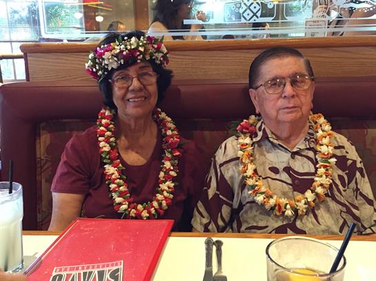 A couple of people sitting at a table