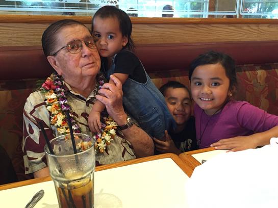 A man holding a group of children