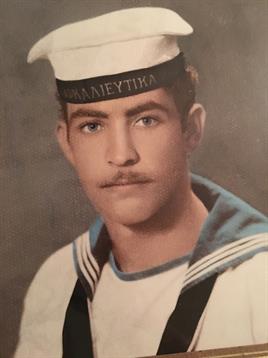 A man in a sailor outfit