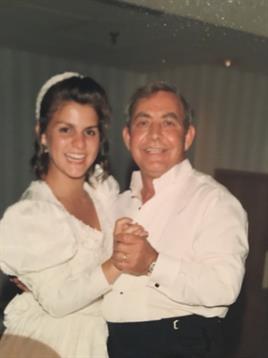 A man and woman holding hands