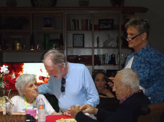 A group of people sitting around a table