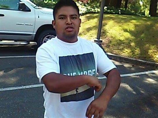 A man standing in a parking lot