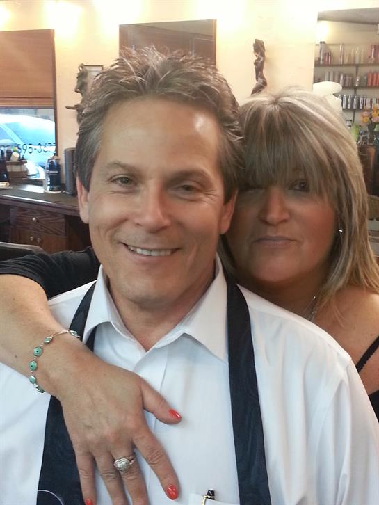 A man and woman posing for a picture