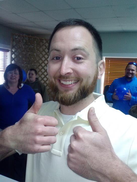 A man giving a thumbs up