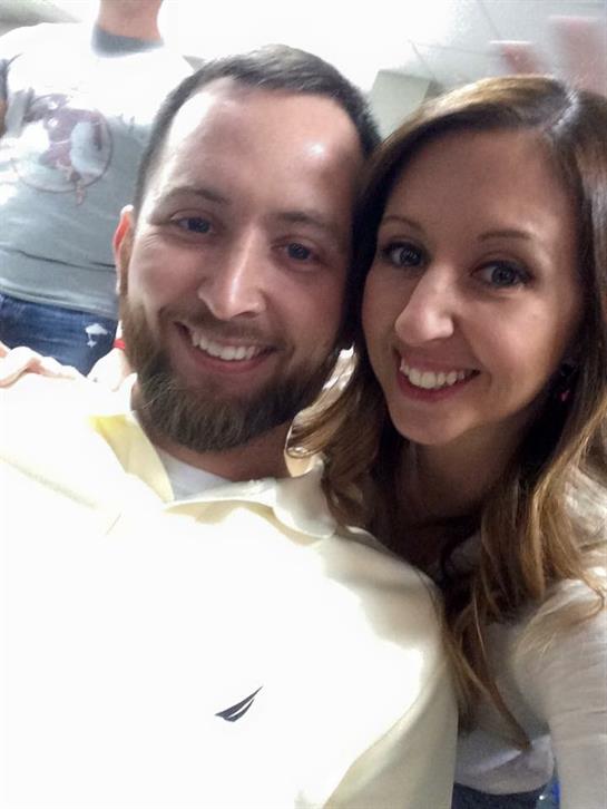 A man and woman taking a selfie