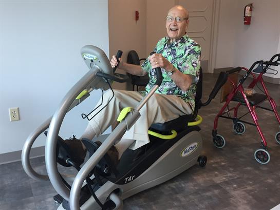 A man on an exercise bike