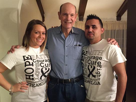 Friends in matching shirts share smiles and hope at a cozy cancer awareness event.