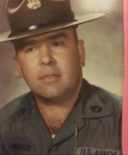 Portrait of a military officer in uniform, showcasing pride and authority typical of the era.