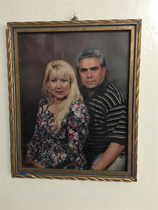 A man and woman in a picture frame