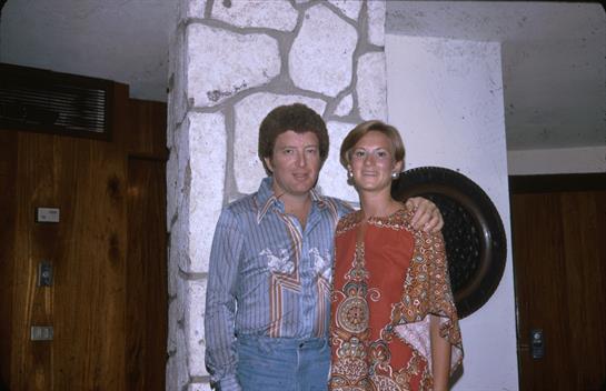 A man and woman standing next to each other