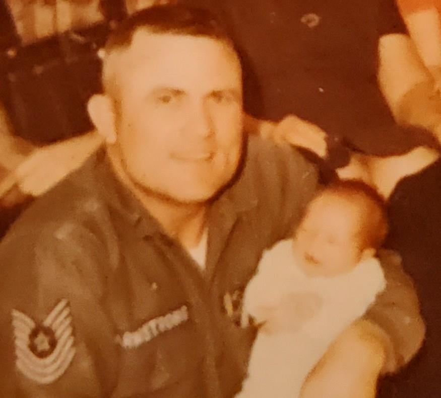 A man holding a baby