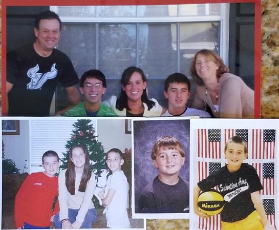 Family members smile together in a cheerful atmosphere, near a decorated Christmas tree.