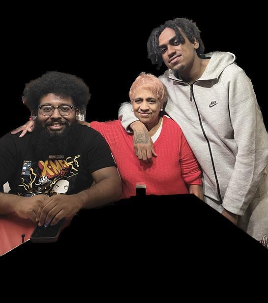 Family members share smiles and laughter in a casual gathering. A joyful atmosphere prevails.