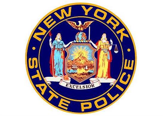 Emblem features New York State Police on a blue background with symbols of justice.