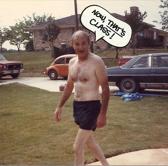 A man confidently strolls down the driveway under clear skies, enjoying a sunny day.