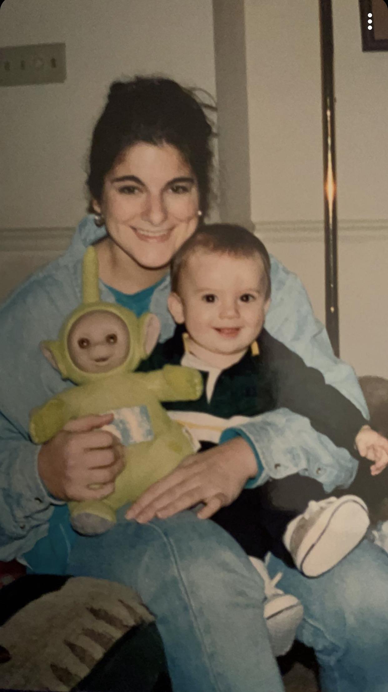 A woman holding a baby