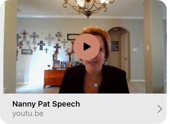 A confident speaker shares impactful messages in a cozy home environment, inspiring the audience.