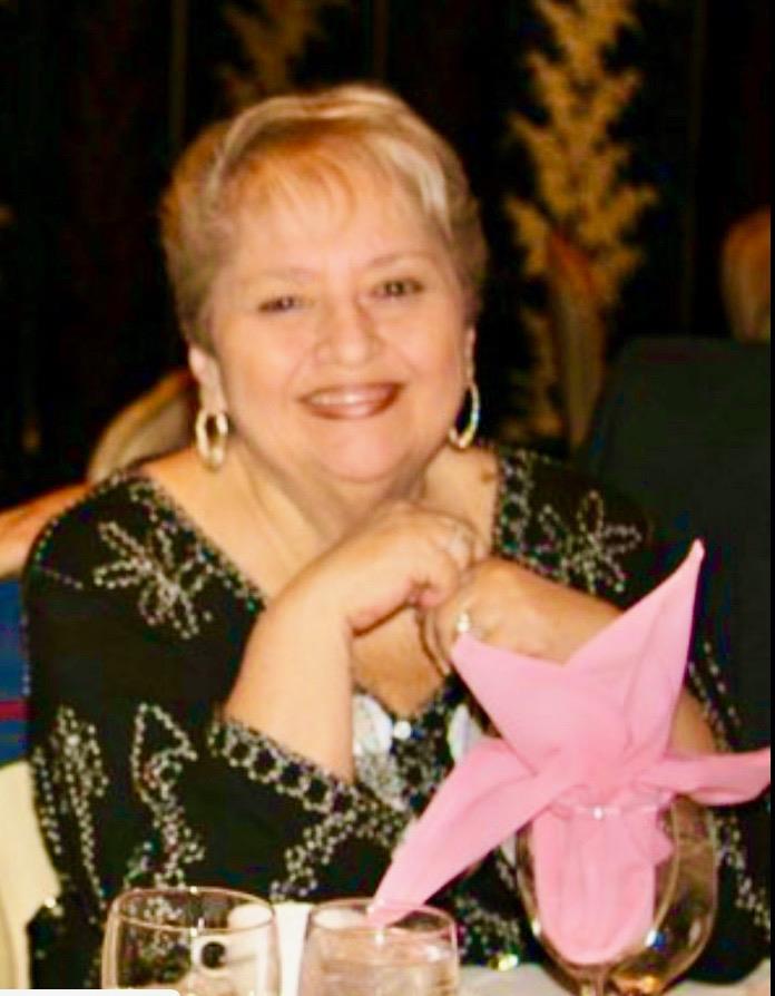 A woman smiling at camera