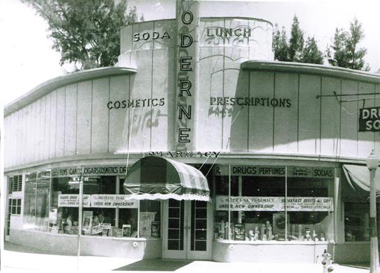 Historic pharmacy showcases a soda fountain and lunch counter, highlighting its mid-century charm.