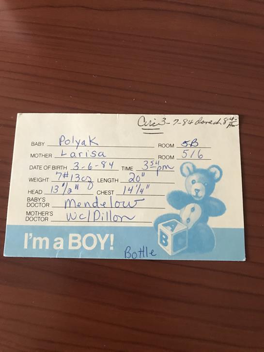 Card records details of a baby boy's birth, including weight, length, and birth time.